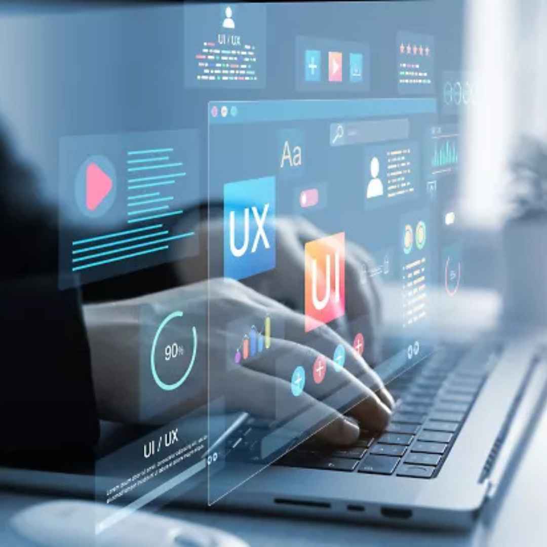 Person using a laptop with UI/UX design elements overlayed on the screen